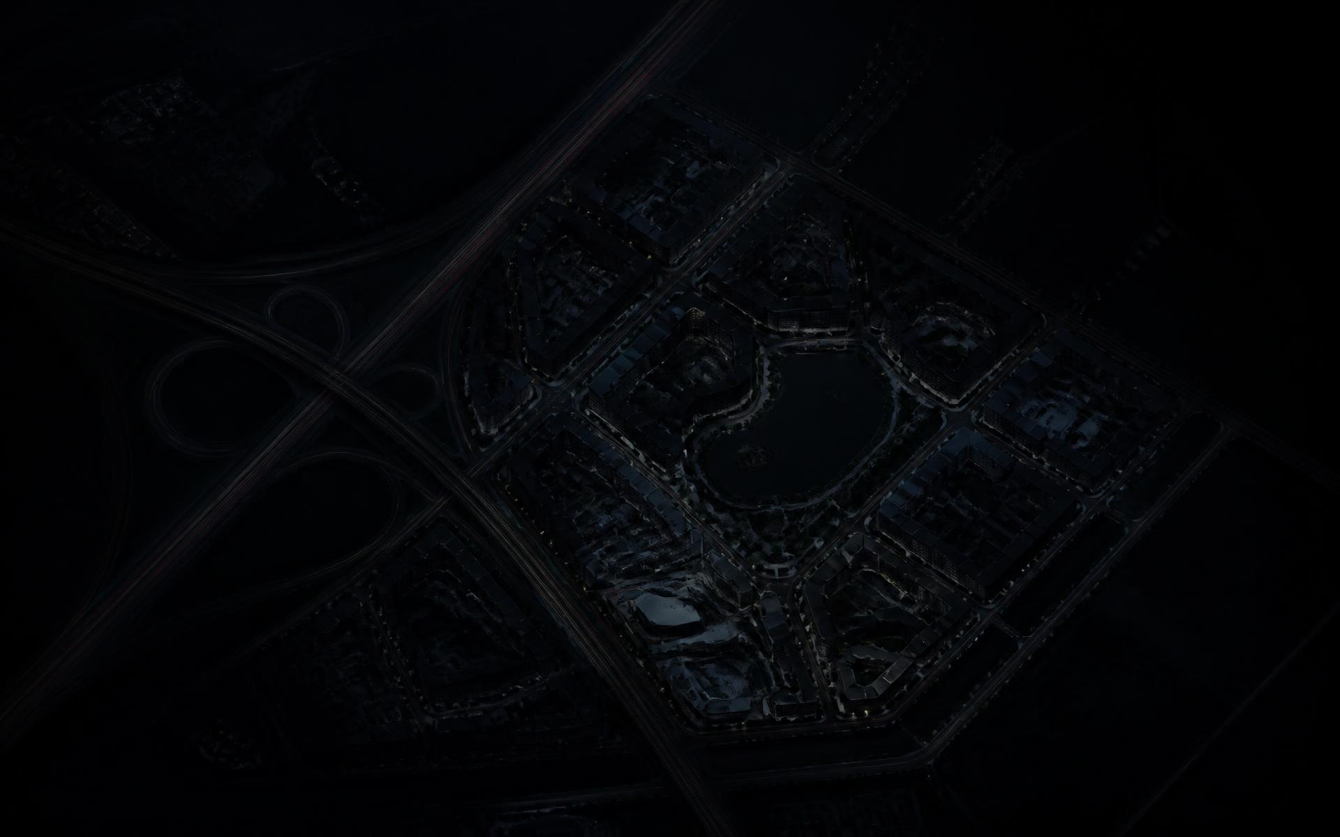 Dark aerial view of the planned Neopolis district and highway corridors
